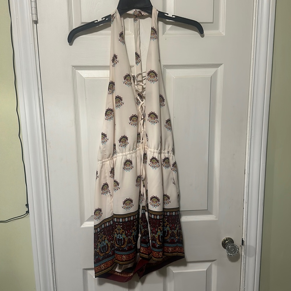 Romper with open back v neck and halter top tie at the neck